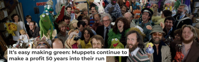 The artists and crew behind the ‘The Muppet Show,’ including Muppet creator Jim Henson, third from right in the front row, gather for the camera. Nancy Moran/Sygma via Getty Images